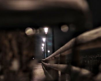 Defocused image of illuminated street light at night