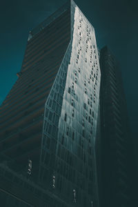 Low angle view of modern buildings against clear sky