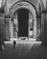 Full length of woman walking in building