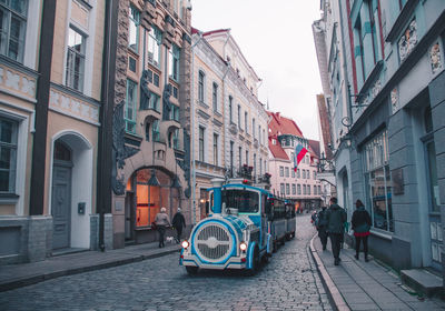 People on street in city