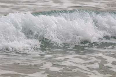 Waves splashing on shore