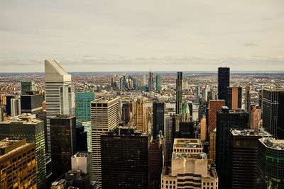 High angle view of buildings in city against sky