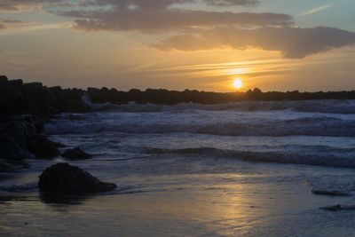 Scenic view of sea against sky during sunset