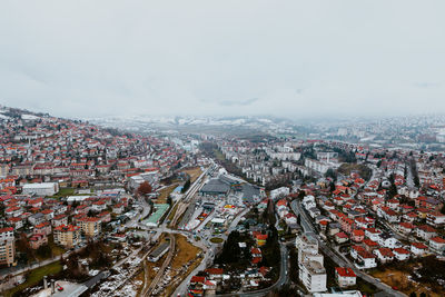 High angle view of street amidst buildings in city