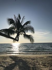 Scenic view of sea against sky at sunset