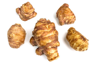 High angle view of cupcakes against white background