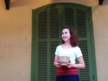 Young woman standing outdoors