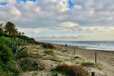 Scenic view of beach against sky