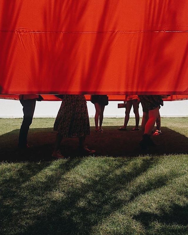 men, person, lifestyles, low section, leisure activity, walking, standing, side by side, shadow, in a row, outdoors, umbrella, togetherness, unrecognizable person, day, sunlight