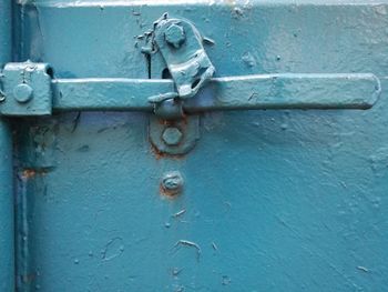 Close-up of padlock on door