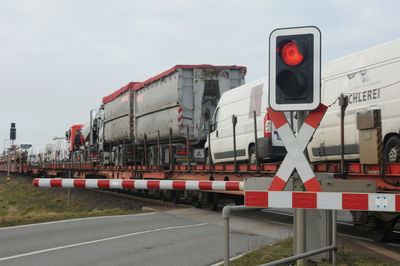 Train on railroad track against sky