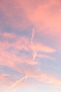 Low angle view of cloudy sky at sunset