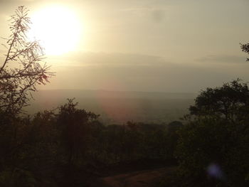 Scenic view of landscape against sky during sunset