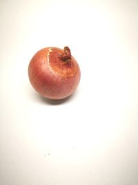 High angle view of apple against white background