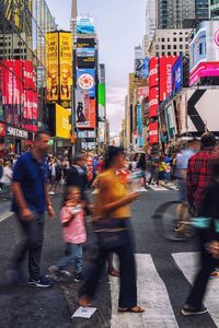 People walking on city street