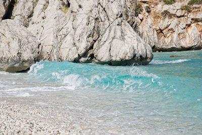 Scenic view of rocks in sea