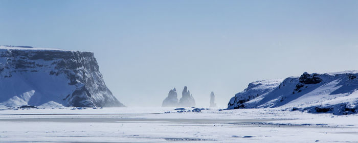 Panorama shot of three pinnacles of vik, south iceland in wintertime