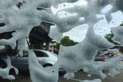 Close-up of wet window in rainy season