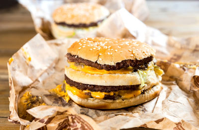 Close-up of hamburger on paper