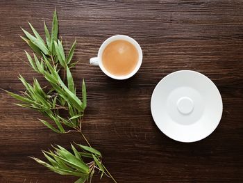 High angle view of coffee cup on table