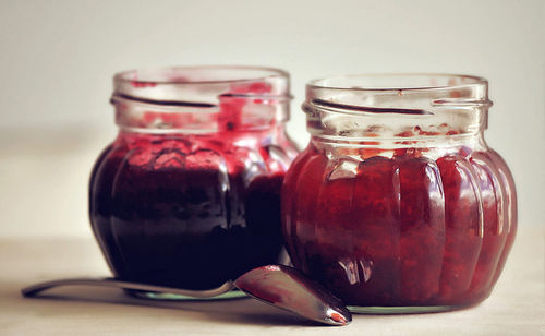 Close-up of preserves in jars on table