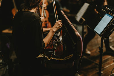 Woman playing guitar