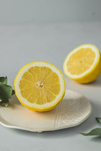 Close-up of lemon slice in plate