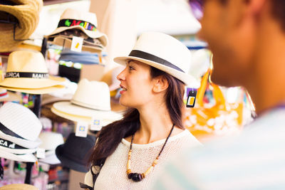 Young woman looking down at store