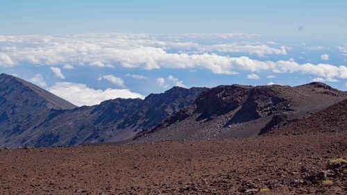 Scenic view of arid landscape against sky