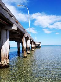 View of bridge over sea against sky