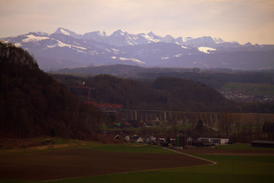 Scenic view of field against mountains