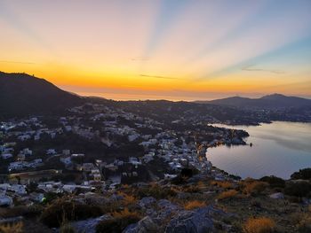 High angle view of townscape against sky during sunset