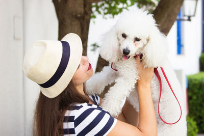 Portrait of woman with dog