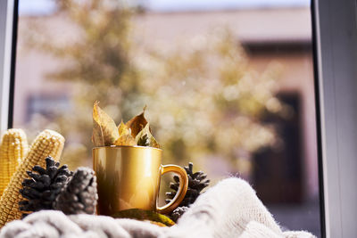 Close-up of coffee cup on table