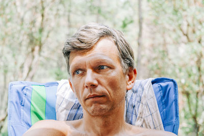 Portrait of man wearing hat outdoors