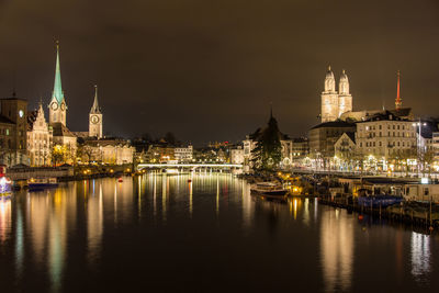 Illuminated buildings at waterfront