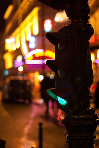 Close-up of illuminated city street at night