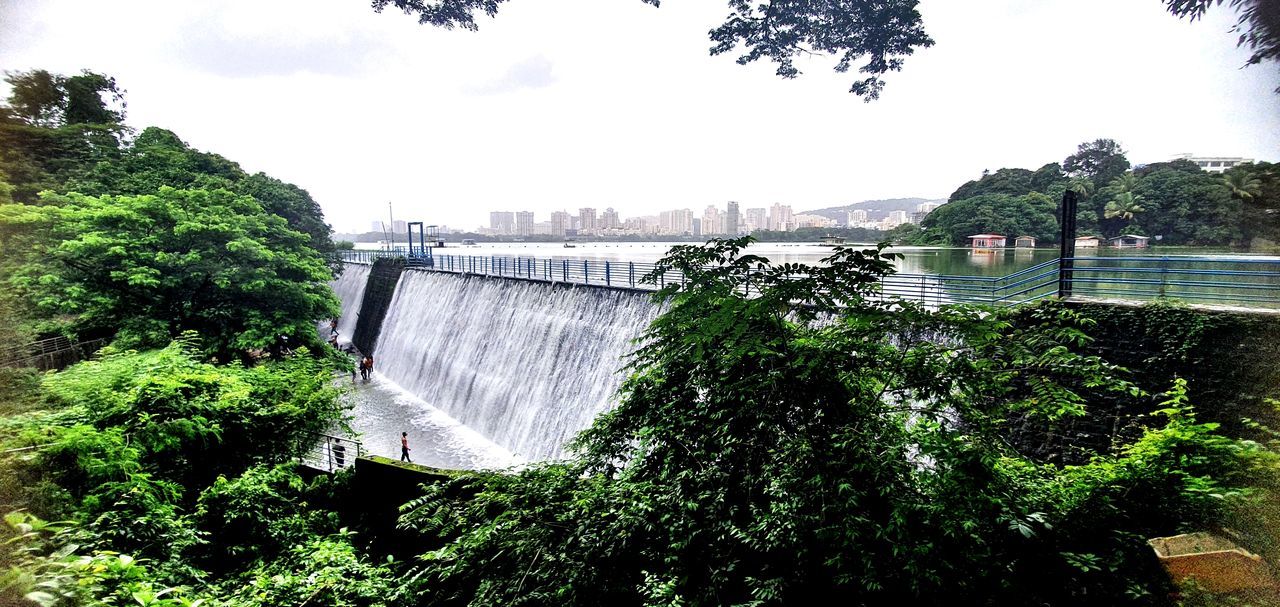 plant, tree, water, waterfall, nature, architecture, built structure, sky, day, motion, growth, dam, no people, hydroelectric power, environmental conservation, outdoors, cloud, river, beauty in nature, building exterior, green, bridge, scenics - nature, waterway, environment, renewable energy, travel destinations