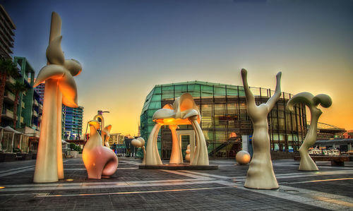 Statue of stuffed toy against sky