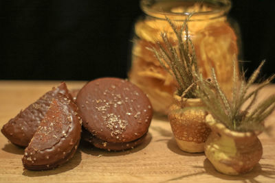 Close-up of ice cream in glass jar on table