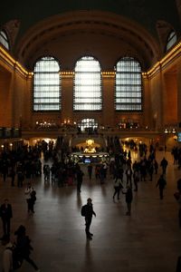 People walking at railroad station