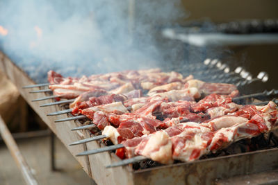 Close-up of meat on barbecue grill