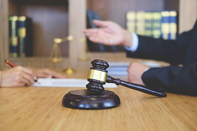 Client with lawyer at desk