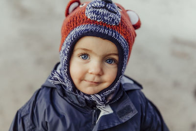 Portrait of cute girl in warm clothing