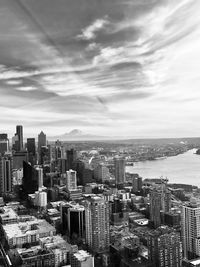 High angle view of buildings in city against sky