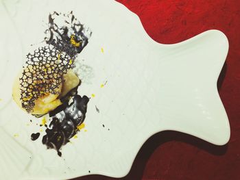 High angle view of chocolate cake in plate on table