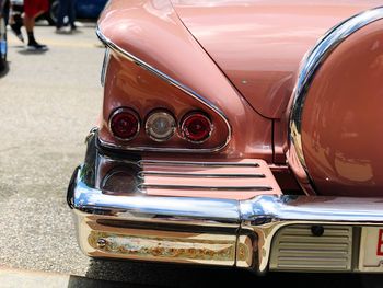 Close-up of vintage car on street