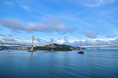 View of suspension bridge over sea