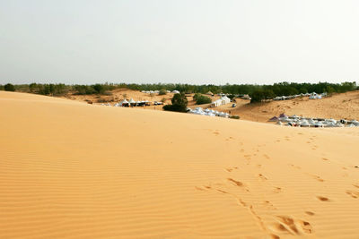 Scenic view of desert against clear sky