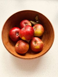 High angle view of apples in bowl on table